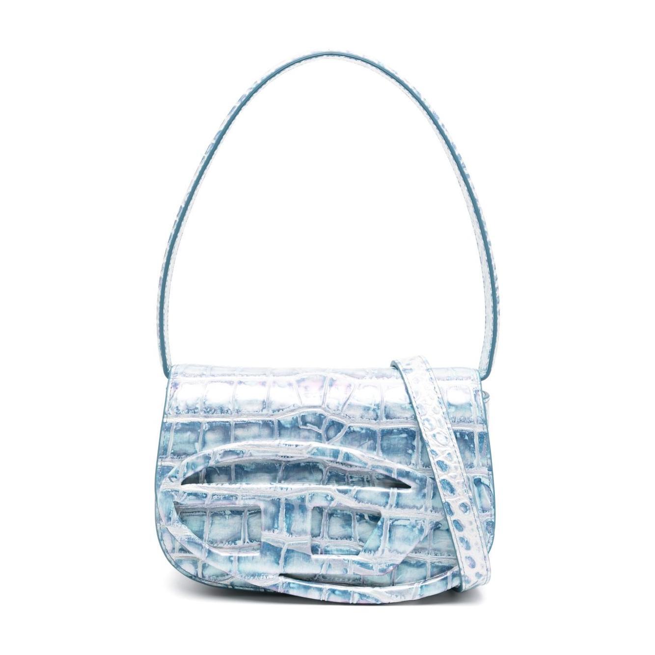 Front view with bag zipped and handles upright.