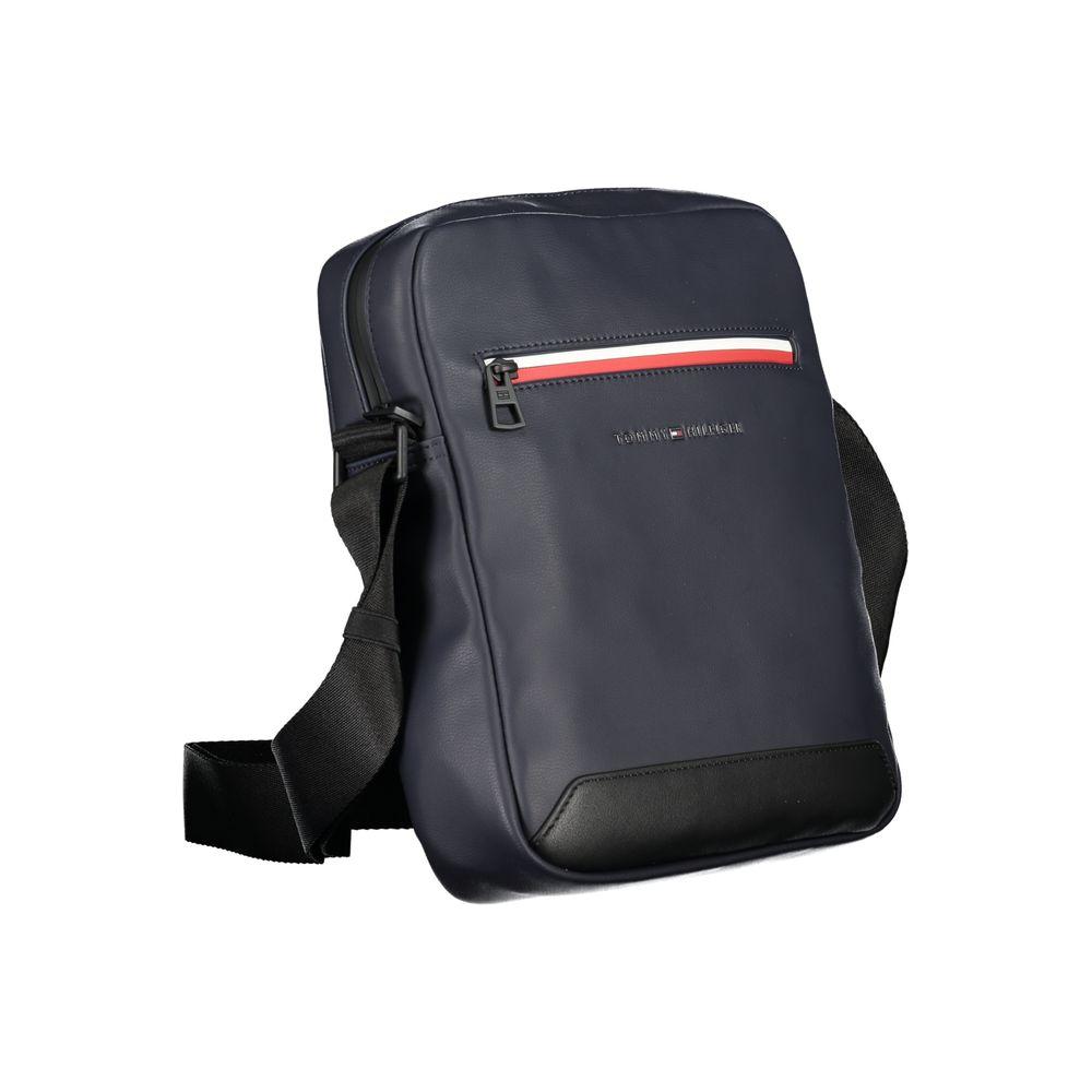 Front view with bag zipped and handles upright.