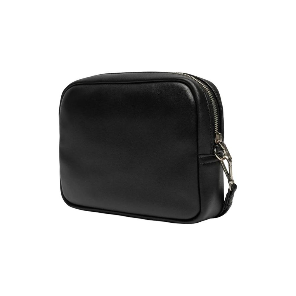 Front view with bag zipped and handles upright.