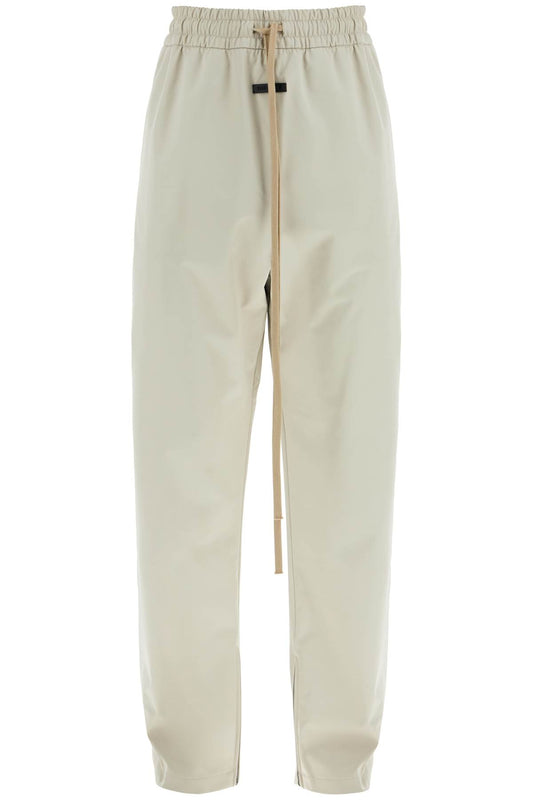 Fear Of God wide leg nylon track pants in cement Trousers Fear Of God